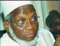 Datti Abubakar wearing a traditional cap