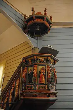 Pulpit decorated with the seven virtues.