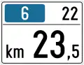 C115 Kilometer sign for state roads