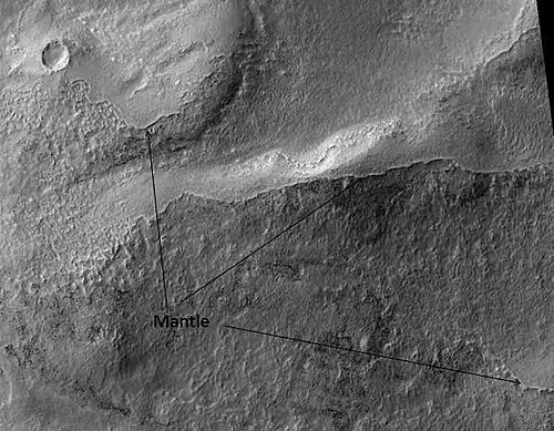 Ptolemaeus Crater Rim. Click on image to see excellent view of mantle deposit. Location is Phaethontis quadrangle.