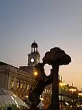 Night time photo of the Bear and the Madroño Tree, heraldic symbol of Madrid