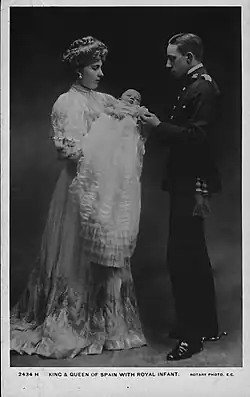 Queen Victoria Eugenie and King Alfonso XIII with newly-born Alfonso, 1908.