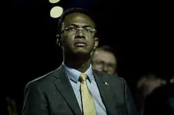 Image of a man in a suit.