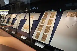 Museum display of the vestment scenes designed by Antonio del Pollaiuolo