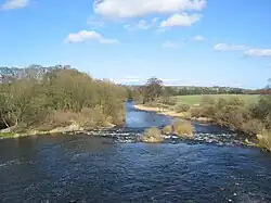River Wharfe east from Harewood Bridge, 53°54′49.31″N 1°31′18.97″W﻿ / ﻿53.9136972; -1.5219361