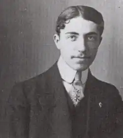 Black-and-white bust-length photo portrait of Prévost; he is wearing a suit and tie