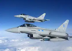 Two Eurofighter Typhoon FGR.4s of No. 6 Squadron with squadron specific codes "EJ" and "EU", March 2013.
