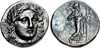 Coinage of Mausolus as Achaemenid dynast of Caria. Head of Apollo facing/ Zeus Labrandos standing, legend ΜΑΥΣΣΩΛΛΟ ("Maussollo"). c. 376–353 BC.[22]