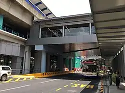 External view of the pedestrian link bridge over Jalan Sultan Mohamed, with the LRT station at left and MRT station at right.