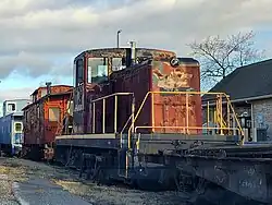 STRT 12 GE 80-tonner locomotive in the siding at Stewartstown Station