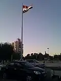 The then-Syrian flag at the square