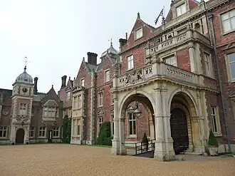 entrance front of house with porte-cochère