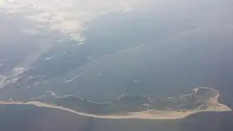 Sandy Hook seen from an airplane (looking west) on its approach to JFK International Airport in Queens, New York City