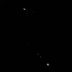 Photograph of the great conjunction of 2020 taken two days before closest approach with the four Galilean moons visible around Jupiter. (Titan can also be seen to the right of Saturn.)