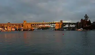 A concrete and steel bridge crossing over a body of water