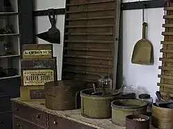 Shaker seed room showing preparation for fill measuring of envelope "papers"
