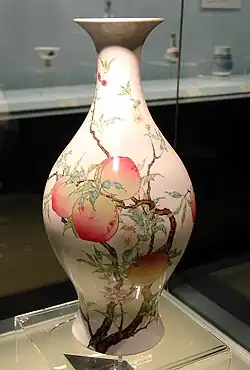 A bottle with bats and peaches. Jingdezhen famille rose ware. Yongzheng reign (1723–1735), Qing. Shanghai Museum.