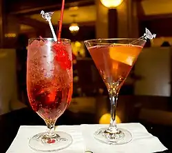 Image 21Mixed drinks: a non-alcoholic Shirley Temple (left) and alcoholic Cosmopolitan (right) (from List of drinks)