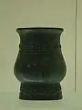 Zhì (觶) wine goblet with ogre-mask motif, Western Zhou