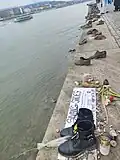 The shoes of Sivan Shahrabani, who was murdered in the Re'im music festival massacre, in the "Shoes on the Danube Bank" memorial