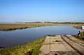 Boats are launched into the final few yards of Hillylaid Pool at Wyre Estuary Country Park