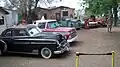 Juan Delgadillo's collection of vintage Chevrolets. Pictured l to r: 1949 Deluxe coupe, 1963 half-ton pickup, unidentified fender, 1950 half-ton pickup, 1970 Impala hardtop, 1939 one-ton fire truck