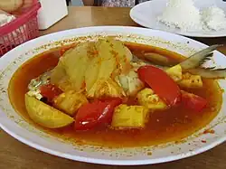 Asam pedas ikan featuring snapper fish, prepared and served in Batam, part of the Riau Islands, Indonesia