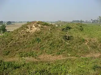 City walls of Shravasti, with the ancient city gate.
