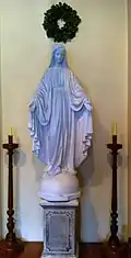 Statue of the Blessed Virgin Mary on the gospel side of the chancel