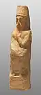 Statuette of a deity wearing a labbadeh, found in Tel Michal