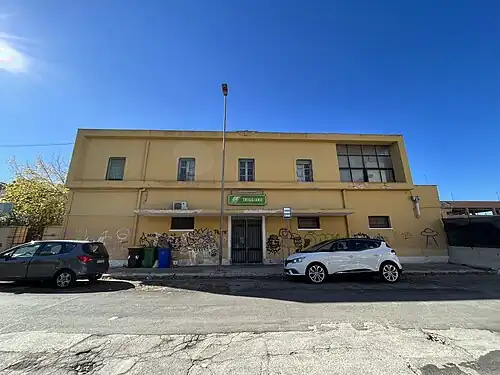 Rectangular two-story building with flat roof