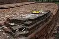 Sujata Stupa Offering at the ruins.
