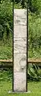 Tall Panel - Charles Bray. Glass, steel and local stone garden sculpture.