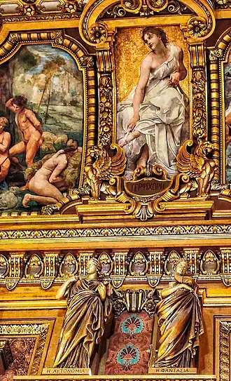 Terpsichore (top, Muse of dance), Autonomia (bottom left, meaning autonomy) and Phantasia (bottom right, meaning imagination), their names are in Greek. Terpsichore = ΤΕΡΨΙΧΟΡΗ, Autonomia = Η ΑΥΤΟΝΟΜΙΑ and Phantasia = H ΦΑΝΤΑΣΙΑ