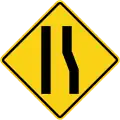 Road narrows on right side