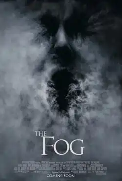 The shape of a face emerging from the fog