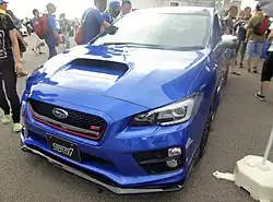 Subaru WRX S4 tS, a high-performance variant of the Subaru WRX. This photo shows the front of the car, which is blue with a small "STI" emblem on the front grille.