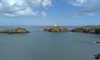 Strumble Head lighthouse, looking across Carreg Onnen Bay