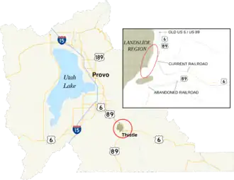 Map showing an area of Utah County circled and enlarged to the southeast of Utah Lake. The enlarged area shows an abandoned rail and highway grades to the west and south of replacement rail and highway grades.