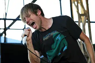 Rickly performing with Thursday in 2012.
