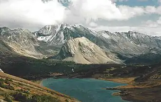 Tilted Mountain centered beyond Baker Lake with Lychnis Mountain in the distance behind all