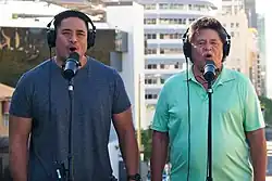 Tinifu Loa Grey and Jerome Faʻanana Grey (right) sing for the 2020 United States census