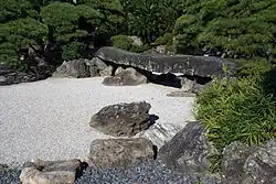 A bridge at Tokushima castle made of two stones resting on a third stone (1592)