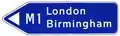 Supplementary sign at a junction with, and indicating, a motorway