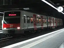 A FGC 213 Series train at the station