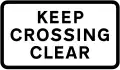 Supplementary plate warning drivers to not block the level crossing