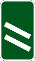 200&nbsp;yd (180&nbsp;m) to a roundabout or the next point at which traffic may leave a primary route