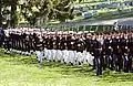 Escort platoons march in the United States Naval Academy Cemetery as part of the ceremonial funeral procession for former chairman of the Joint Chiefs of Staff, Admiral William J. Crowe in 2007.