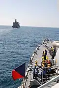 Sailors on board Babur prepare for an underway replenishment with the US Military Sealift Command vessel, USNS John Lenthall in the Arabian Sea in 2007.