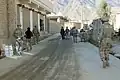 Members of Kunar Provincial Reconstruction Team (PRT-Kunar) walk in the streets of Asadabad.
